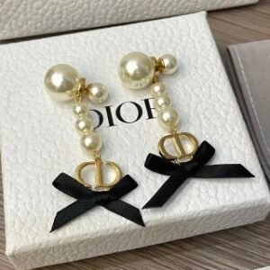 Pearl and bow earrings
